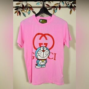 Gucci Pink Short Sleeve Tee with Red Logo and Blue Character